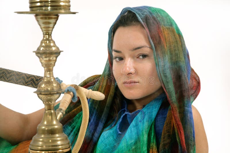 Woman smoking water pipe stock image. Image of arabia 4755561