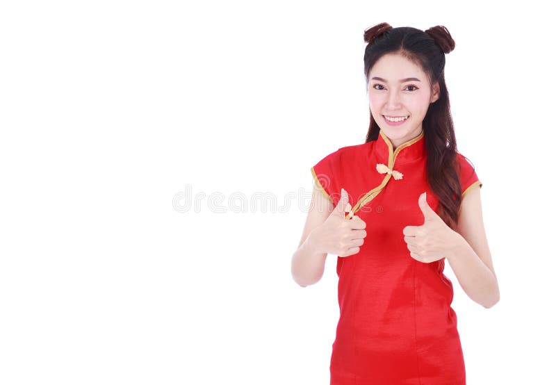Woman wear red cheongsam and thumb up in concept of happy chines royalty free stock photo Woman wear red cheongsam and thumb up in concept of happy chines royalty free stock photo