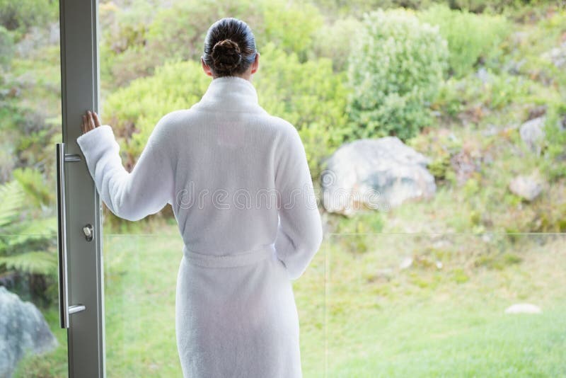 Woman wearing a bathrobe stock photo. Image of looking 43655072