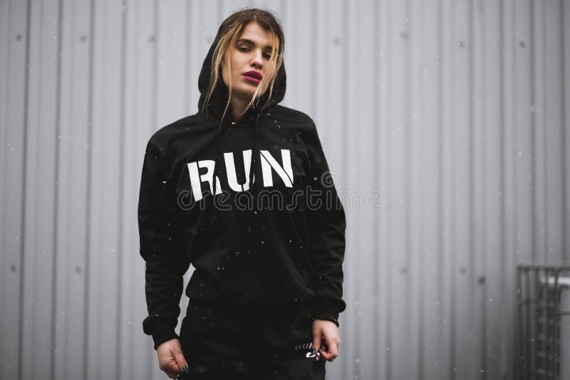 Woman Wearing Black And White Runprinted Pullover Hoodie Picture