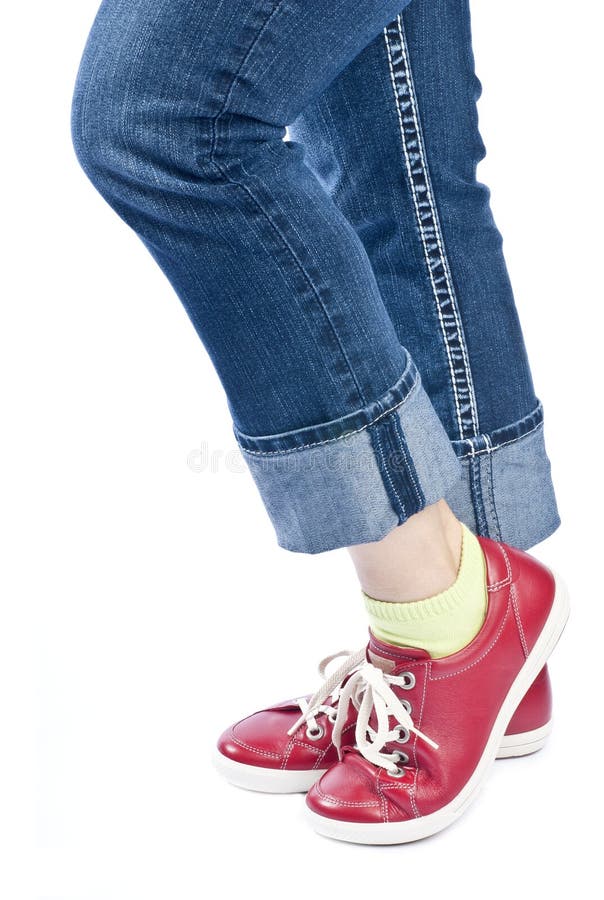Woman Wearing Blue Jeans and Red Leather Shoes