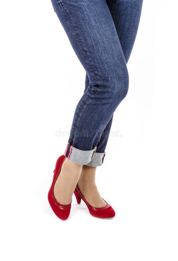 Woman Wearing Capri Blue Jeans and Red Suede Pumps 1