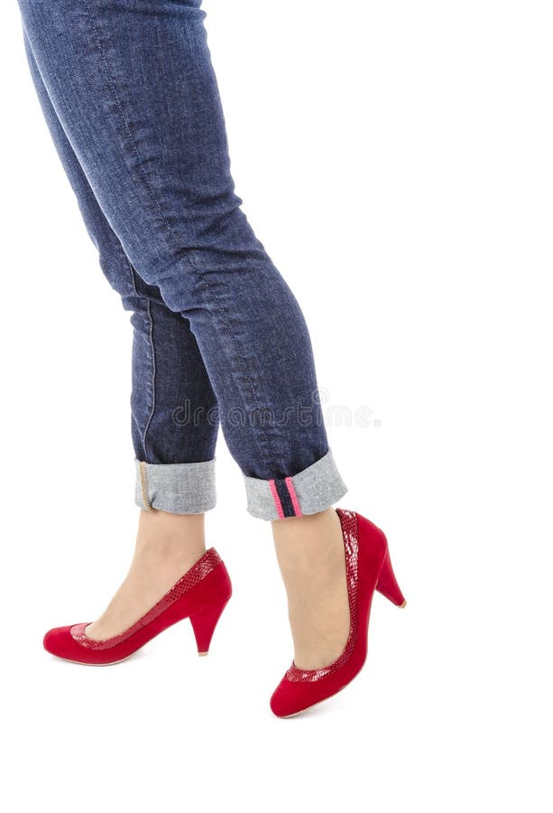 Woman Wearing Capri Blue Jeans and Red Suede Pumps 3