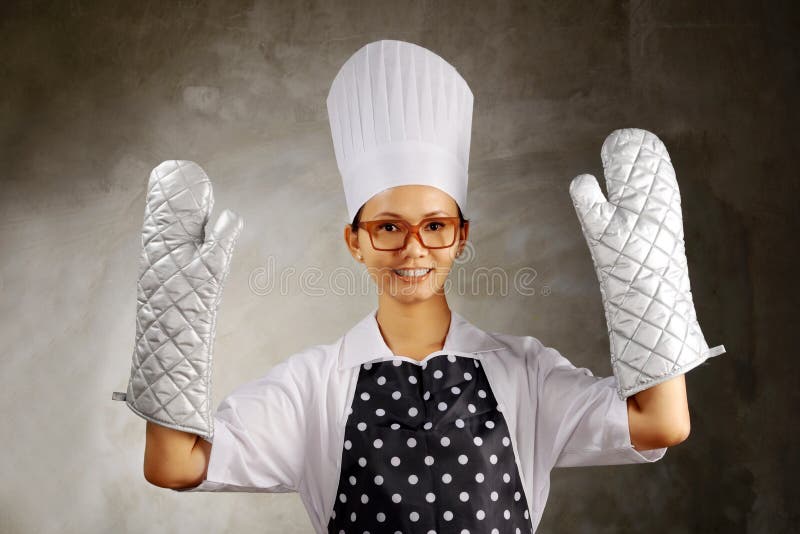 Woman Wearing Cooking Glove Stock Photo Image of asian, utensil 34569868