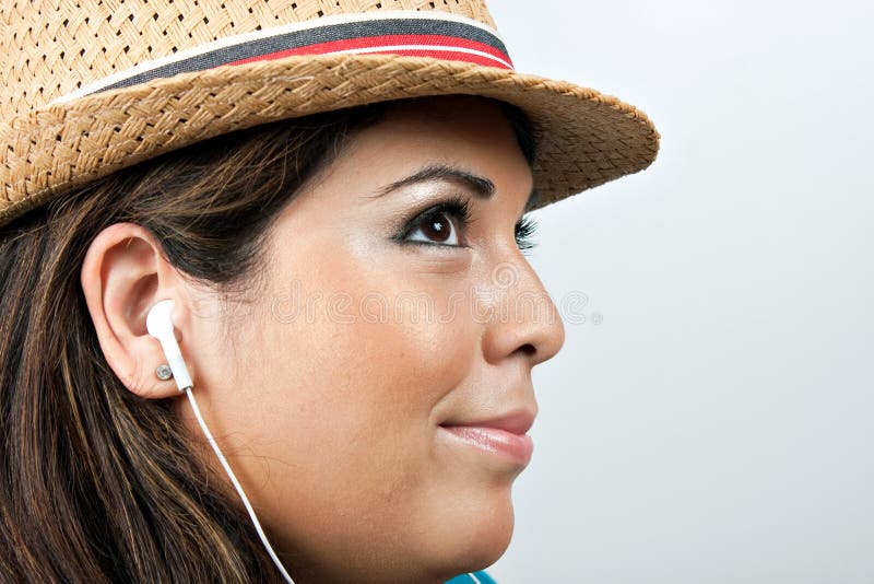 Woman Wearing Earbud Headphones Stock Photo Image of face, attractive