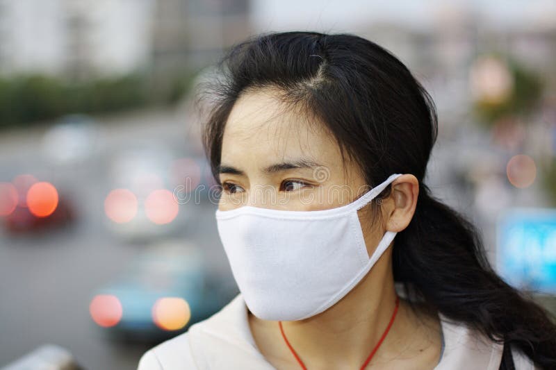 Woman wearing a face mask stock image. Image of h1n1 13337245