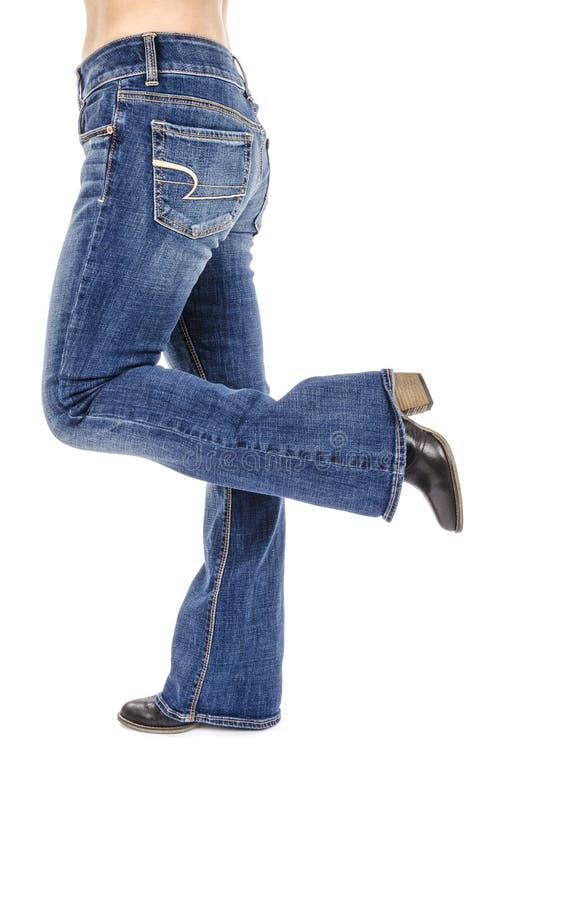 Woman Wearing Flared Blue Jeans and Black Ankle Boots 2