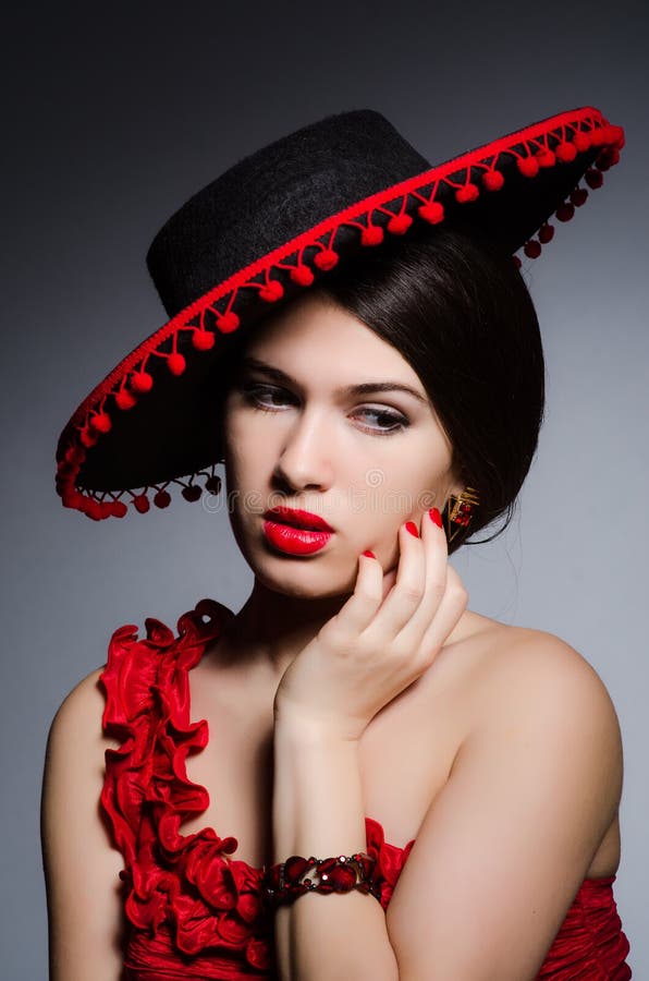 Woman Wearing Hat Against Dark Background Stock Photo - Image of ...