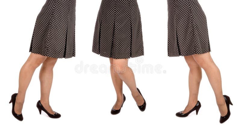 Woman Wearing Polka Dot Mini Skirt and Black Suede Pumps 1