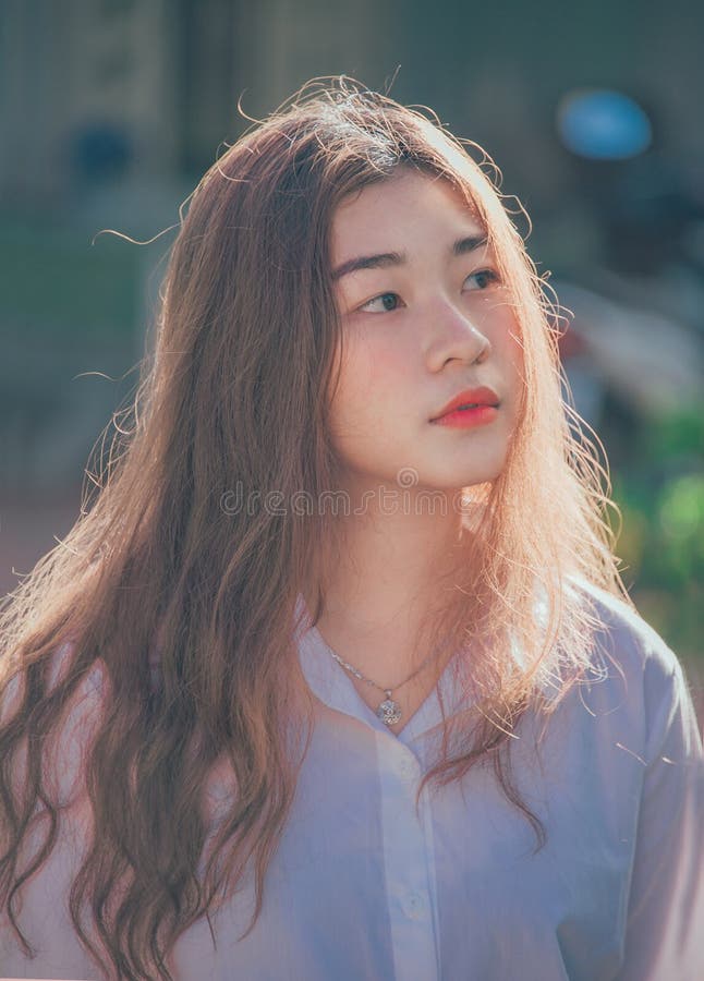 Woman Wearing Purple Button-up Shirt Picture. Image: 110418146