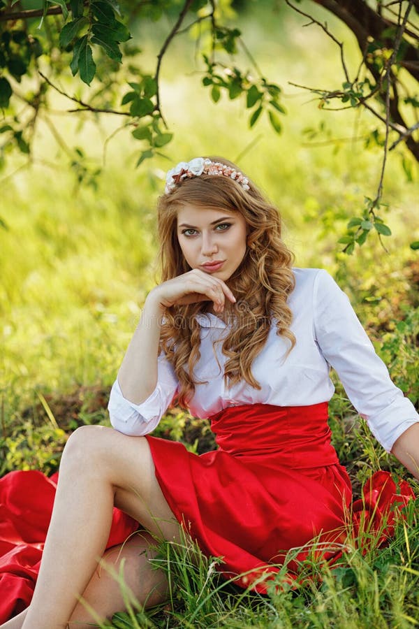 Woman Wearing Red Skirt Sitting Under the Tree Stock Photo - Image of ...