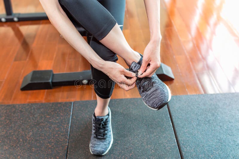 Woman Wearing Running Shoes at Gym. Fitness and Healthy Concept Stock ...