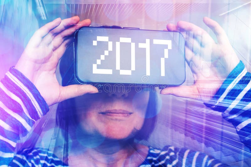 Woman wearing virtual reality headset with number 2017 royalty free stock photos Woman wearing virtual reality headset with number 2017 royalty free stock photos