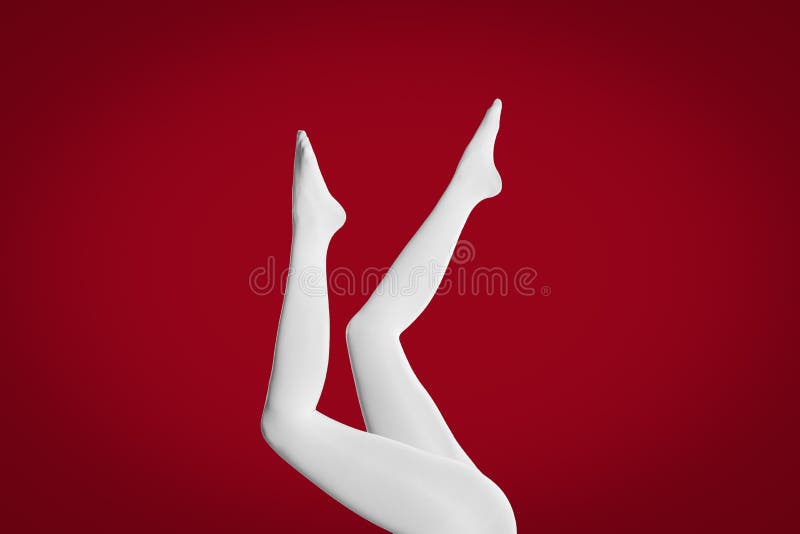 Woman wearing red tights on yellow background, closeup of legs Stock Photo  - Alamy