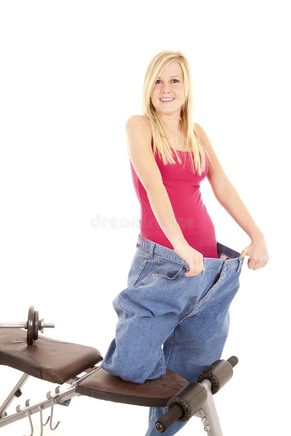 Woman on weight bench big pants