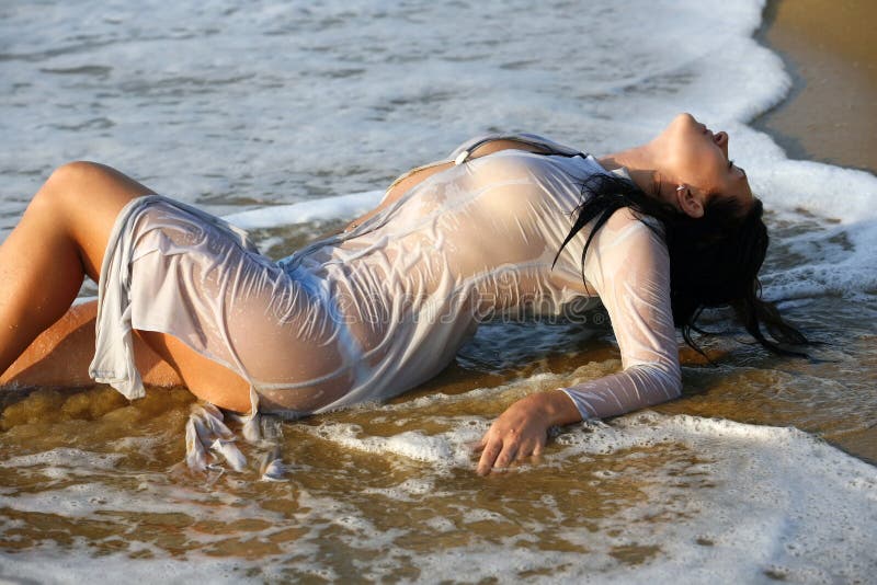 Woman in a Wet Dress at Coast Stock Photo - Image of female,
