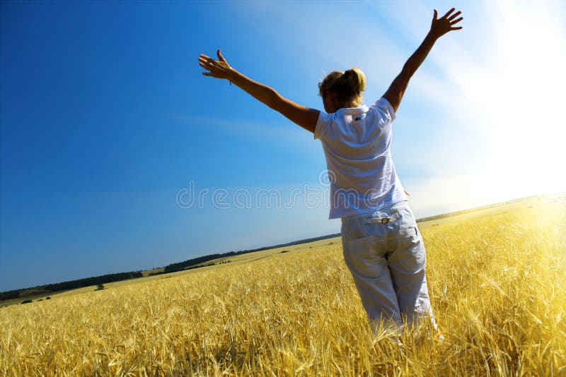 Woman in wheaten field