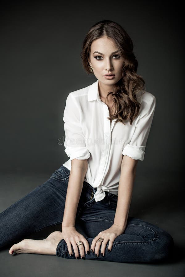 Woman in White Blouse and Blue Jeans Stock Photo - Image of pretty ...