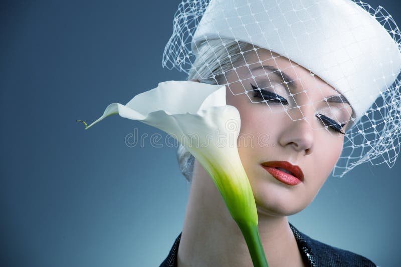 Woman with white kala flower