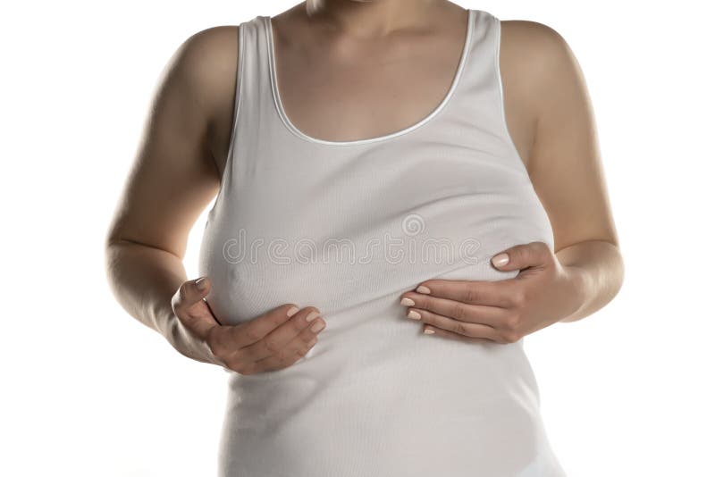 a woman with big breasts without a bra in a white shirt Stock Photo