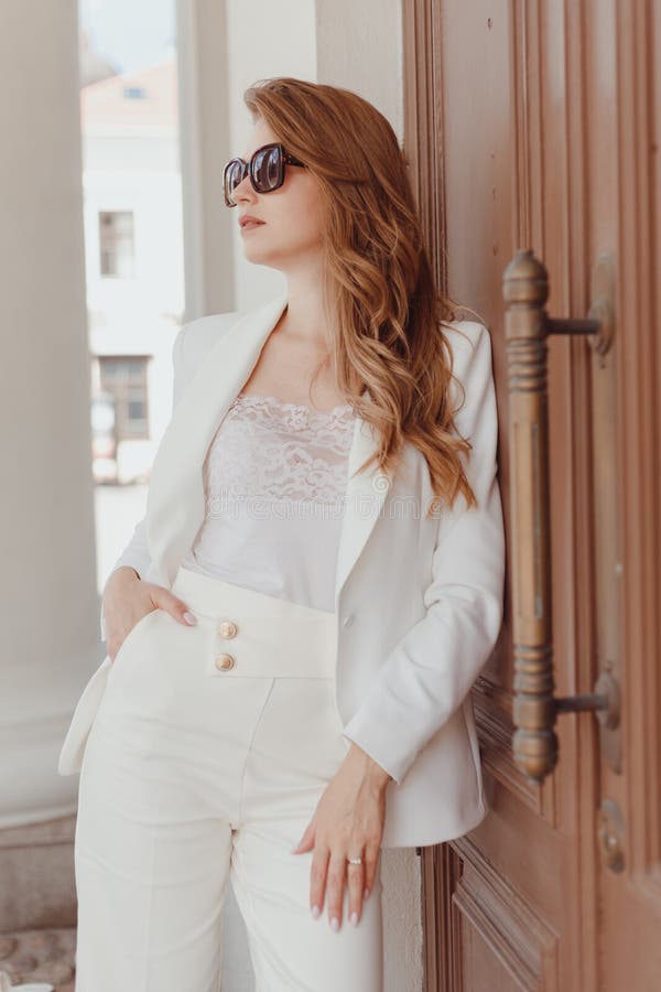 Woman in White Stylish Blazer and Pants and Sunglasses. Elegant Women White  Outfit Stock Image - Image of person, elegance: 228134713