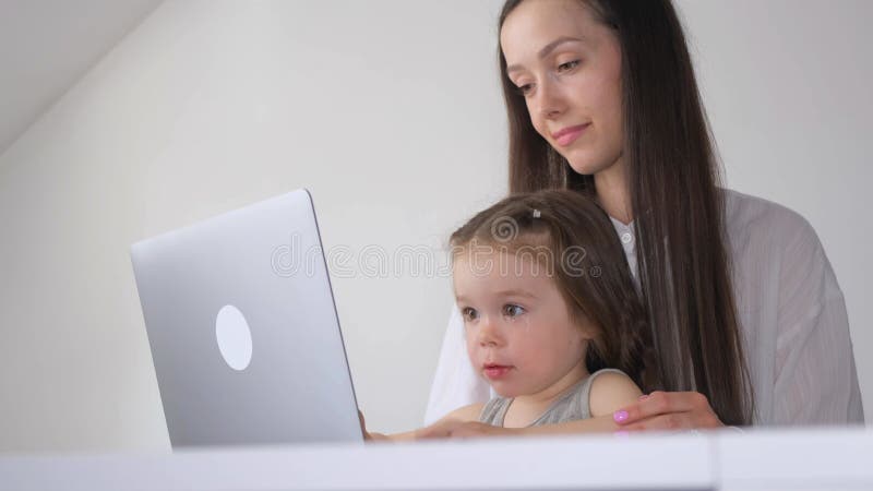 A woman who works from home at the computer. stock footage