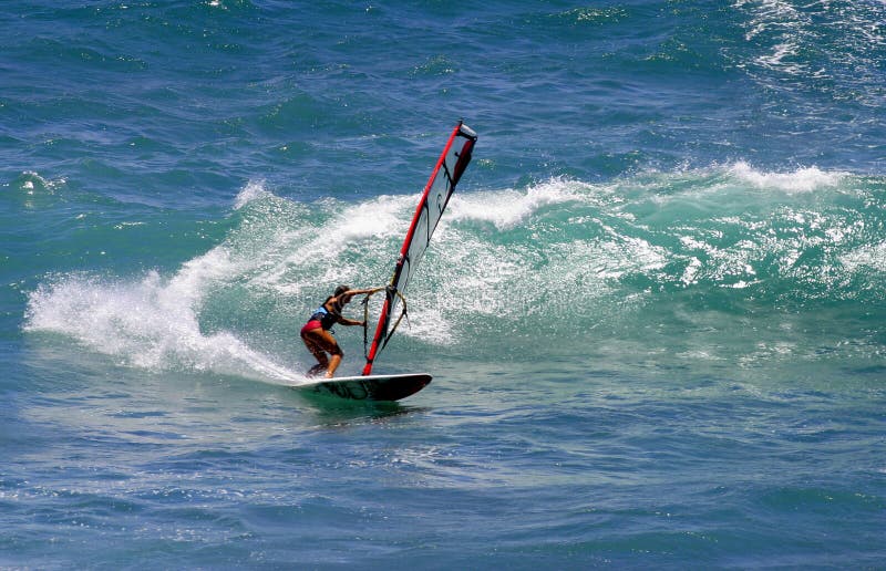 Woman Windsurfing Oahu Hawaii