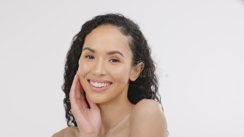 Woman, wink and smile portrait for beauty and skincare in studio with skin for dermatology cosmetics. Aesthetic model stock video