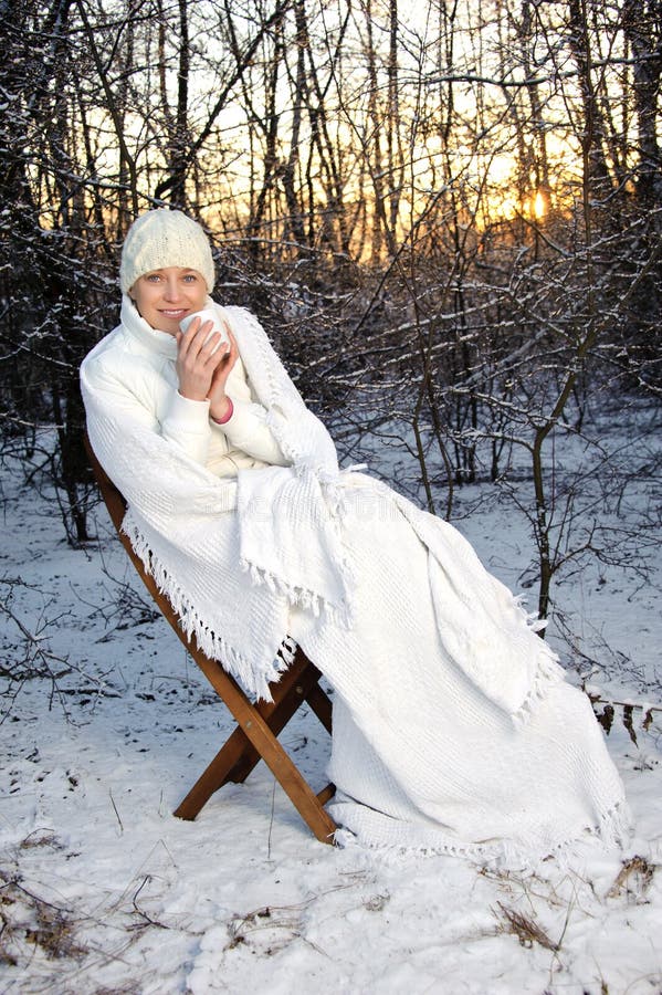 Woman in the winter forest