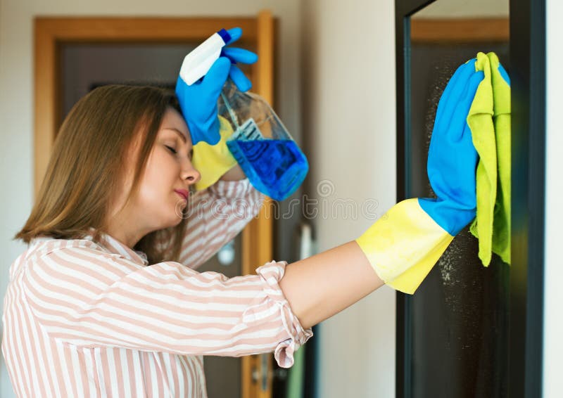 Very tired of cleaning the house stock images.