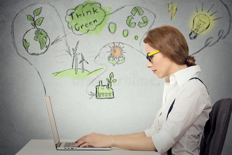 Woman working on computer solving ecology, renewable energy problem royalty free stock photo Woman working on computer solving ecology, renewable energy problem royalty free stock photo