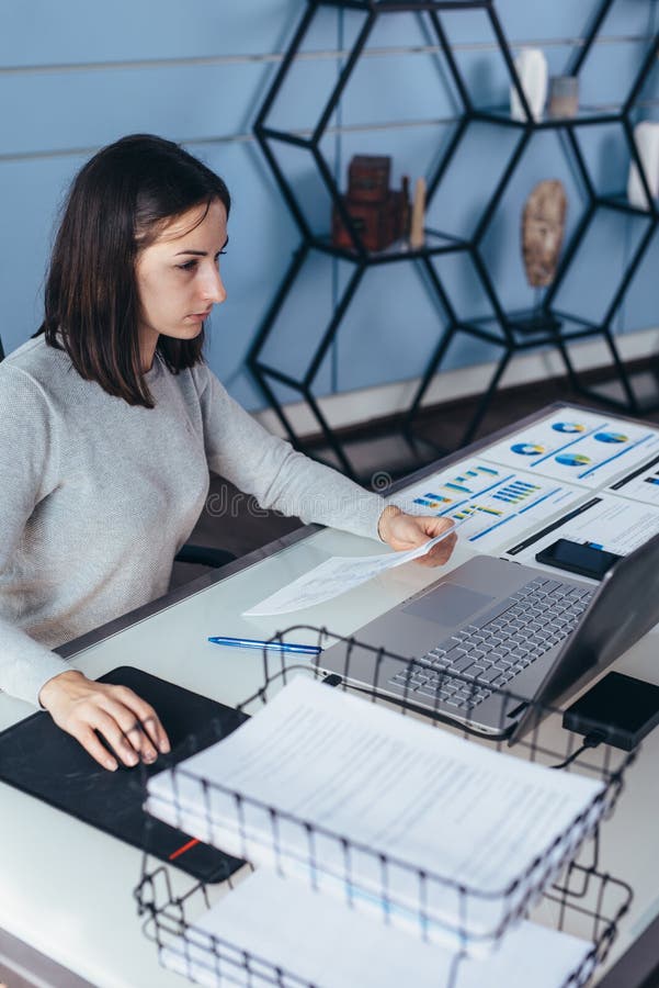 Woman Working at Her Office Desk with Documents and Laptop. Stock Image Image of occupation