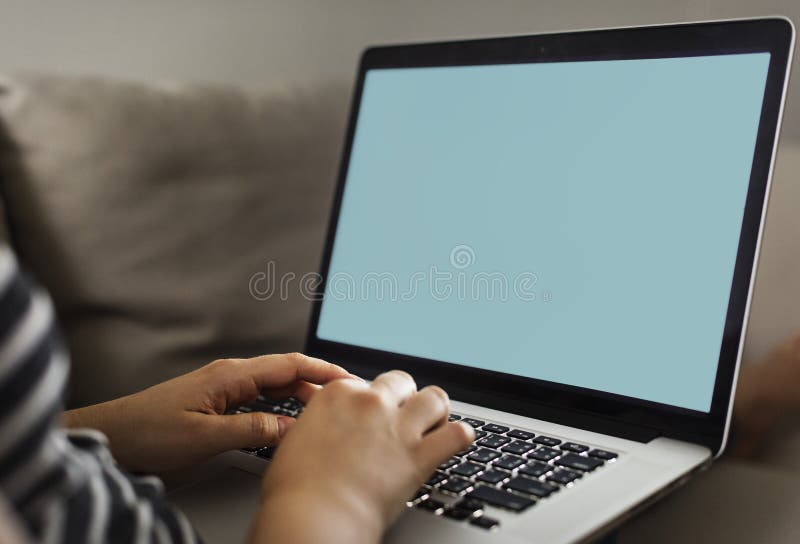 Woman working on a laptop stock photo