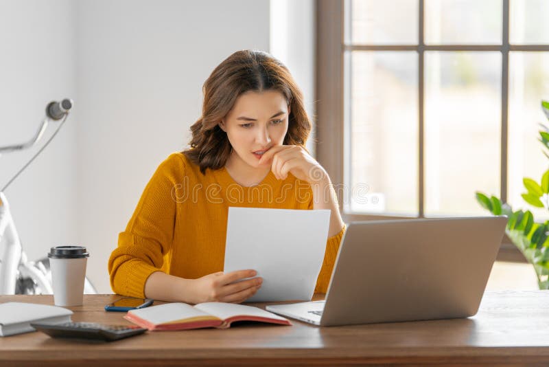 Woman working in the office stock image