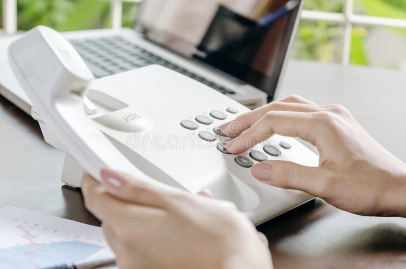 Woman working in office stock images