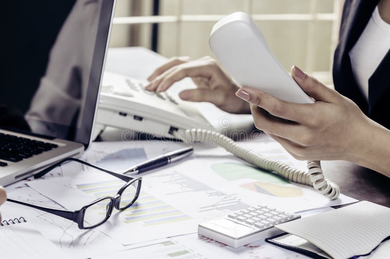 Woman working in office stock images