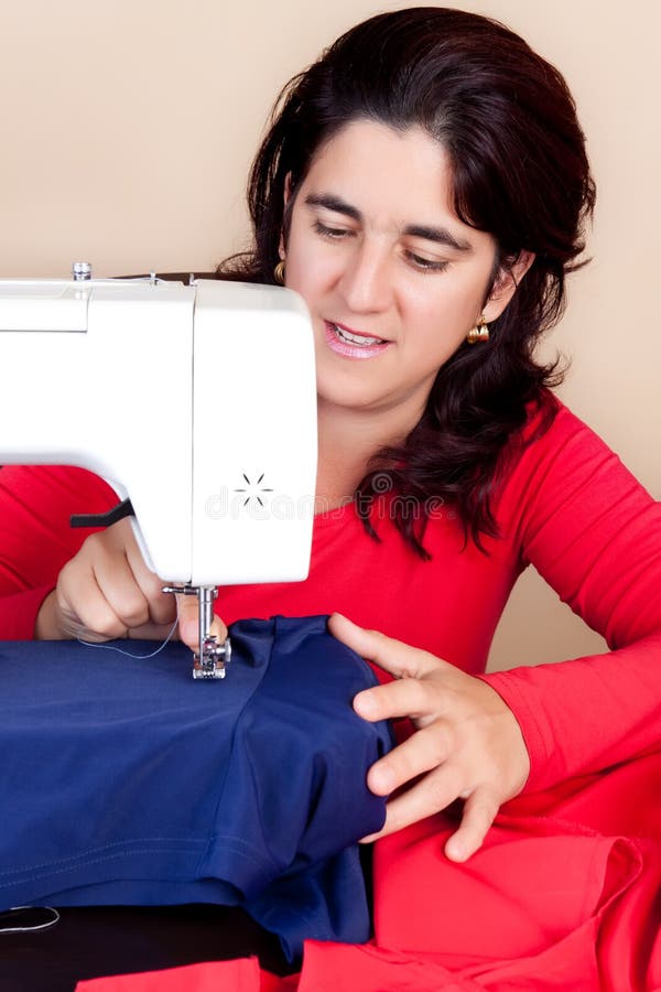 Woman Working on a Sewing Machine Stock Photo Image of fashion