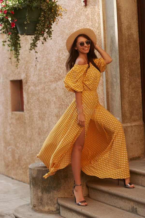 Woman in Yellow Polka Dot Dress in ...