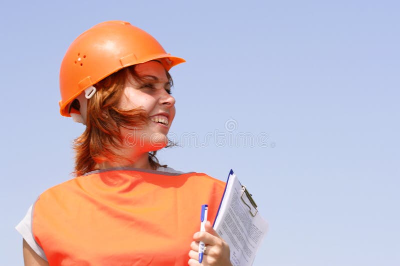 Woman with yellow safety helme