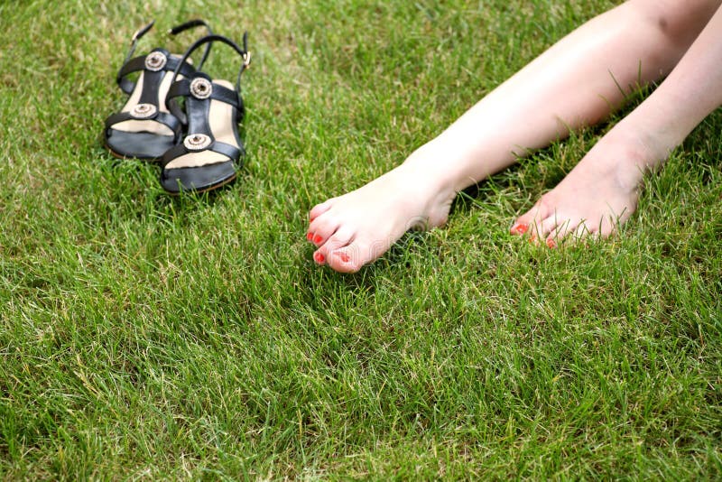 Womans Bare Feet on Green Grass Stock Image - Image of bare, nature ...