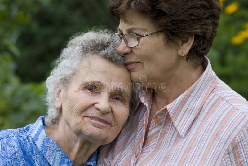 Elderly woman with her daughter. Old granny stock images, royalty-free photos and pictures