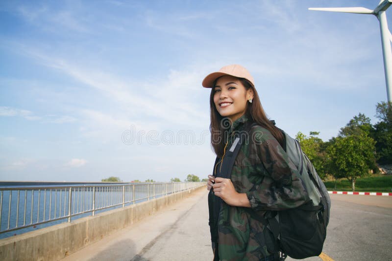 Women asian with bright backpack for the tourist traveler stock photography