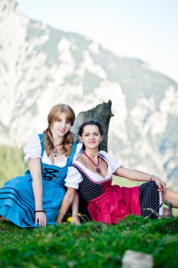 Women in the Austrian Alps stock photo. Image of grass - 27672826