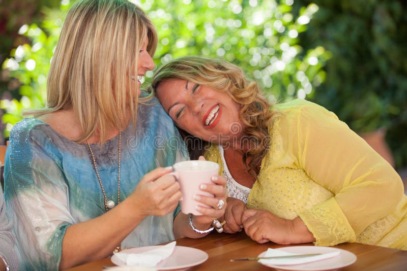 Women, best friends laughing