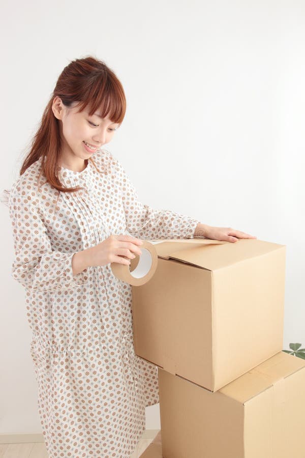 Women and cardboard stock image. Image of adult, life - 22852869
