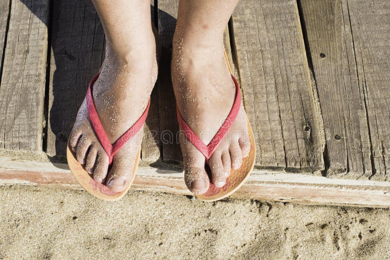 Women foots on the beach stock photo. Image of foot, girl - 43871688