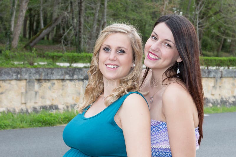 Blonde lesbian teens in the pool