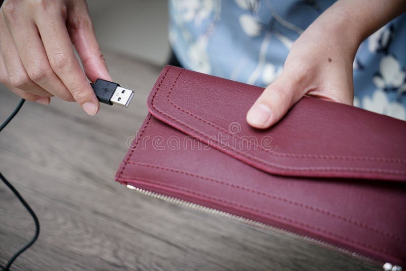 Women hand charging money wallet royalty free stock image