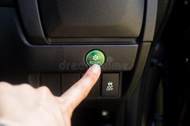 Women Hand Press Eco Mode In Car. Stock Photo Image of