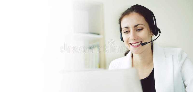 Women happy smiling customer support operator with headset. communication concept. panoramic banner with copy space.